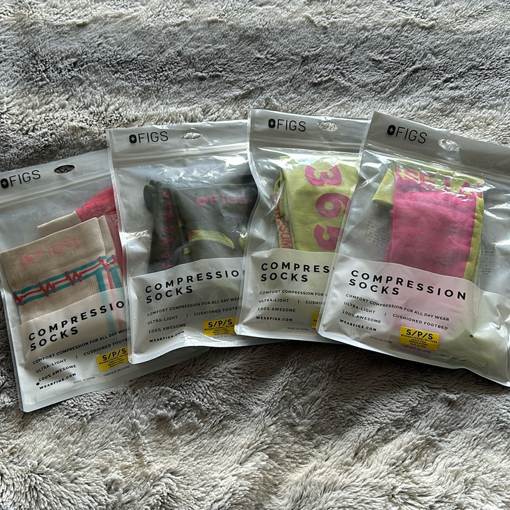 Bulk lot of new unopened FIGS Compression socks.